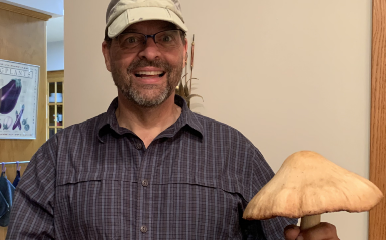 David King holding a mushroom